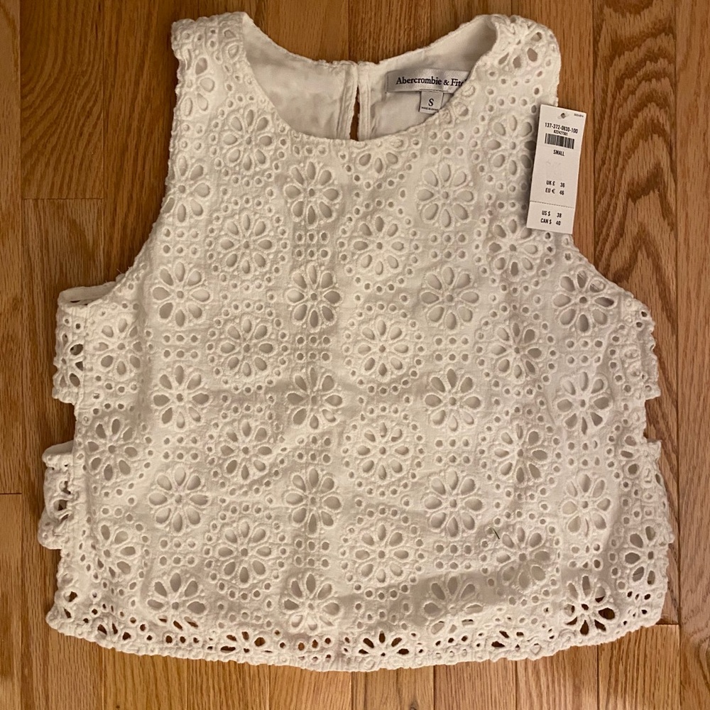 never worn, with tags